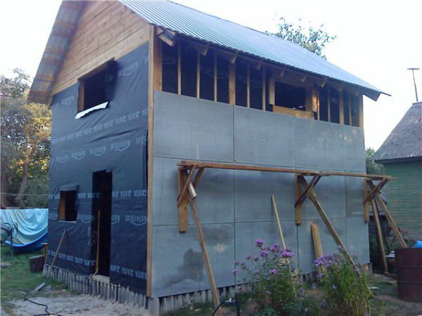 Зашивка стен дома из плоского шифера