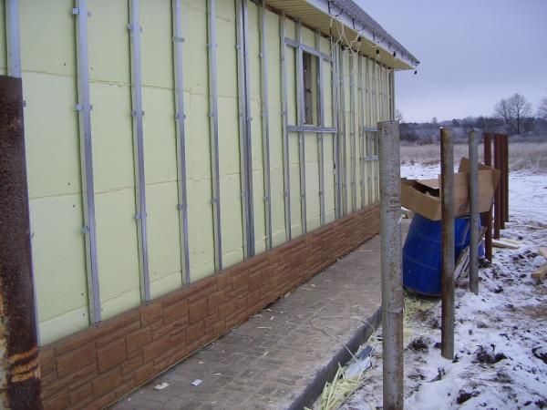 фасадные пластиковые панели под камень