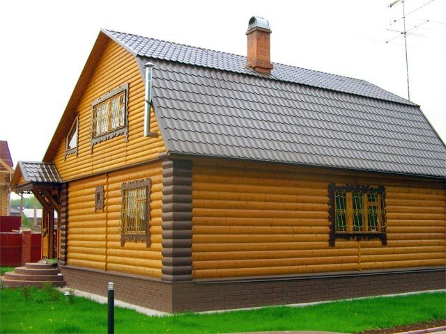 углы выделенные темным материалом делают строение значительно выше